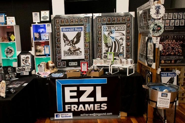 A market stall with framed sporting memorabilia